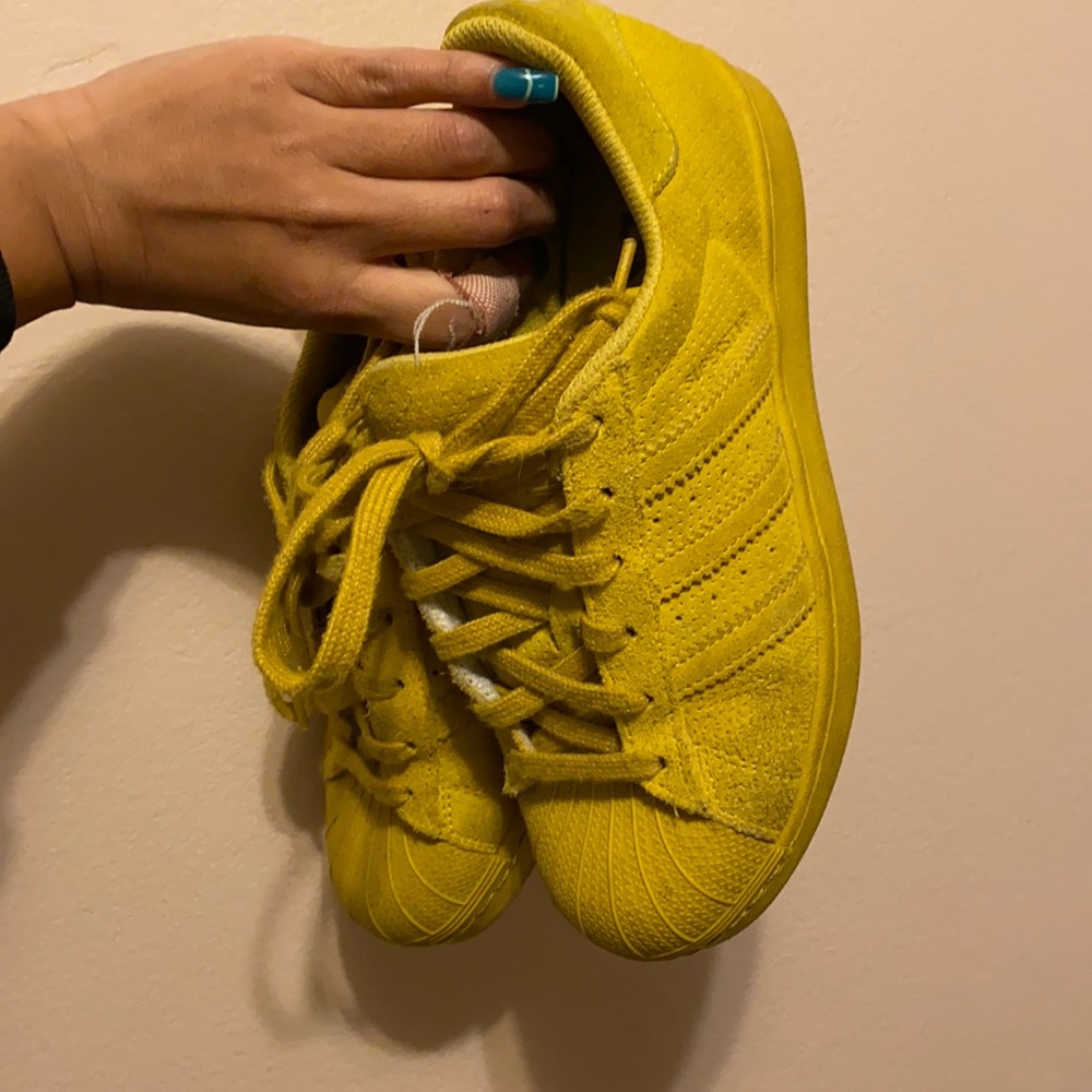 Yellow superstars adidas